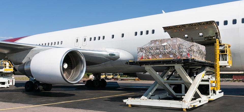 Air cargo solutions in Chennai with aircraft loading freight at airport